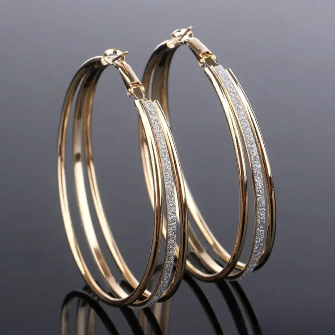 Pendientes de aro retro dorados