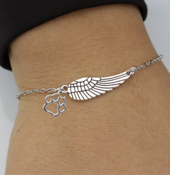 Pulsera Conmemorativa de Plata con Ala de Ángel y Huella de Patas | Hecha a Mano