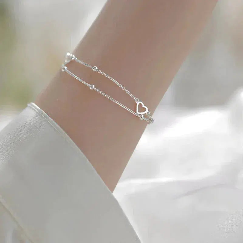 Pulsera de Corazón de Plata con Ajuste Personalizable