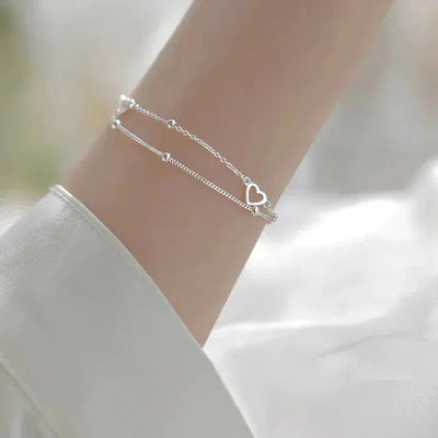 Pulsera de Corazón de Plata con Ajuste Personalizable