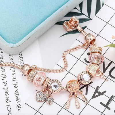 Pulsera Atrapa Sueños de Rosa con Charms en Plata de Ley Incluida