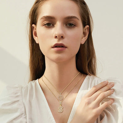 Collar con inicial de moissanita | Oro