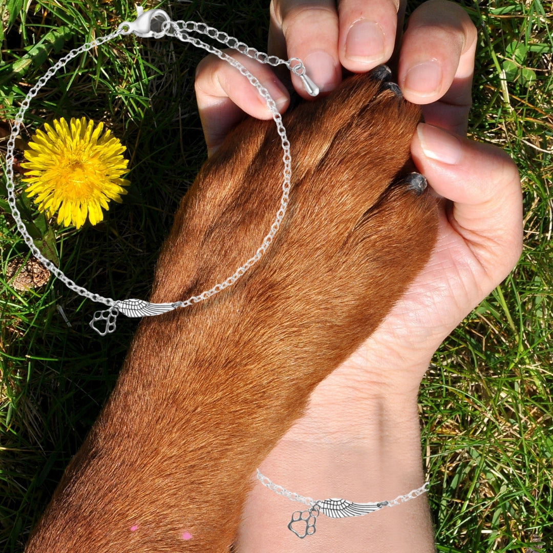 Pulsera Conmemorativa de Plata con Ala de Ángel y Huella de Patas | Hecha a Mano