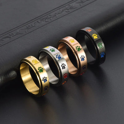 Anillo Giratorio Antiestrés – Acero Inoxidable con Huellas Arcoíris