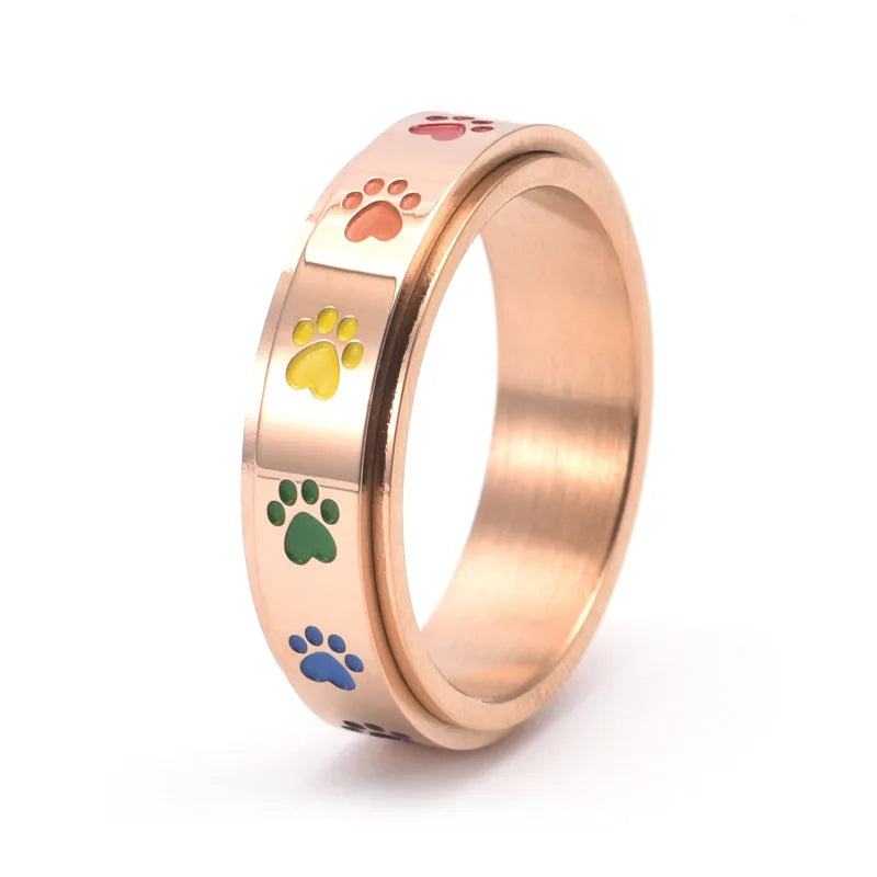 Anillo Giratorio Antiestrés – Acero Inoxidable con Huellas Arcoíris