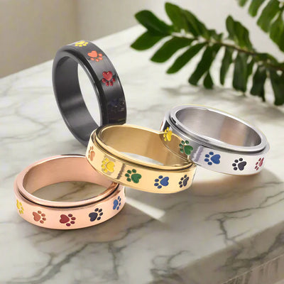 Anillo Giratorio Antiestrés – Acero Inoxidable con Huellas Arcoíris