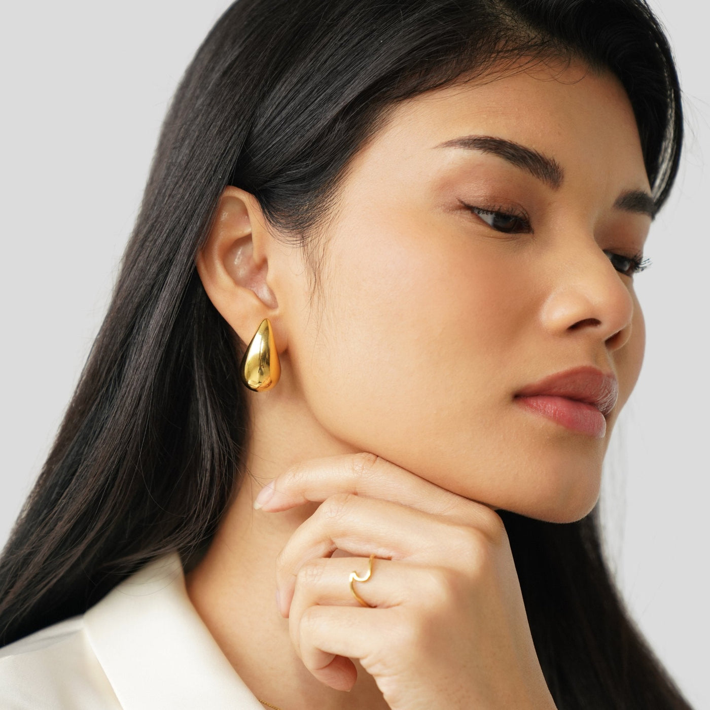 Pendientes de gota de oro Ame